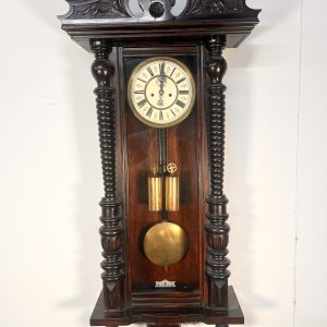 A 19th Century Walnut Cased Vienna Style Wall Clock With Twin Train Weight Driven Movement
