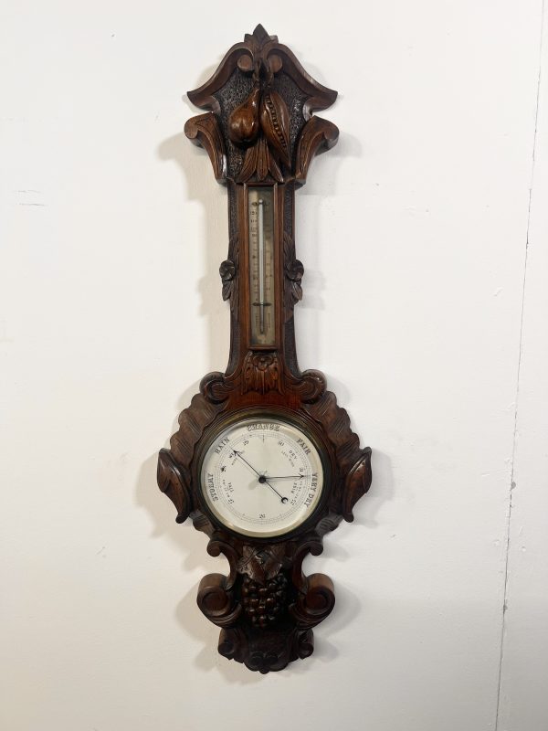 A Huge Edwardian Carved Oak Aneroid Barometer And Thermometer