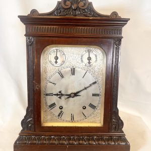 A Large Mahogany Mounted Striking Table Clock With Silvered Dial
