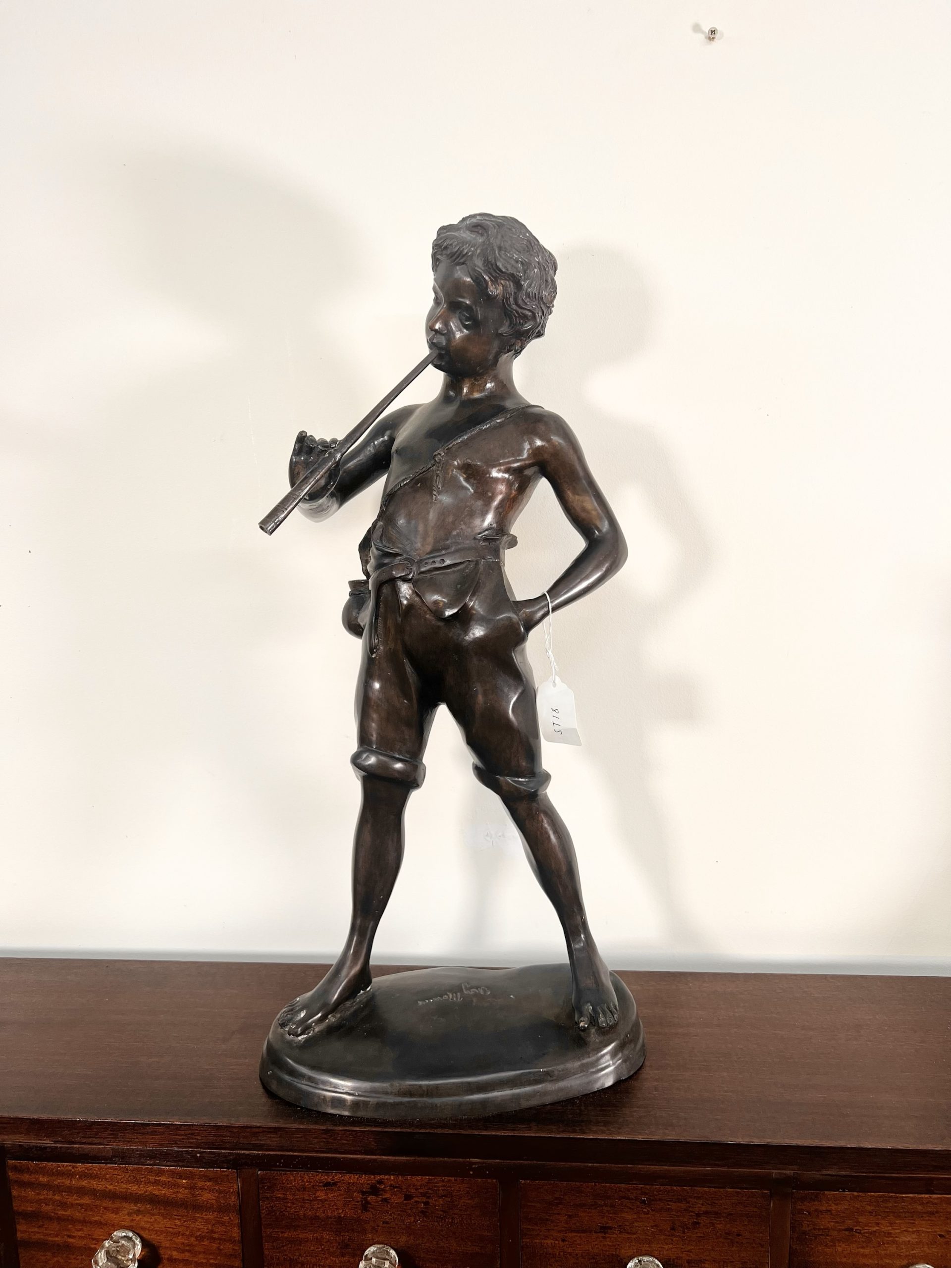 A Large Bronze Sculpture "Boy Playing The Flute" After The Work Of Sculpture Auguste Moreau (French, 1834-1917)